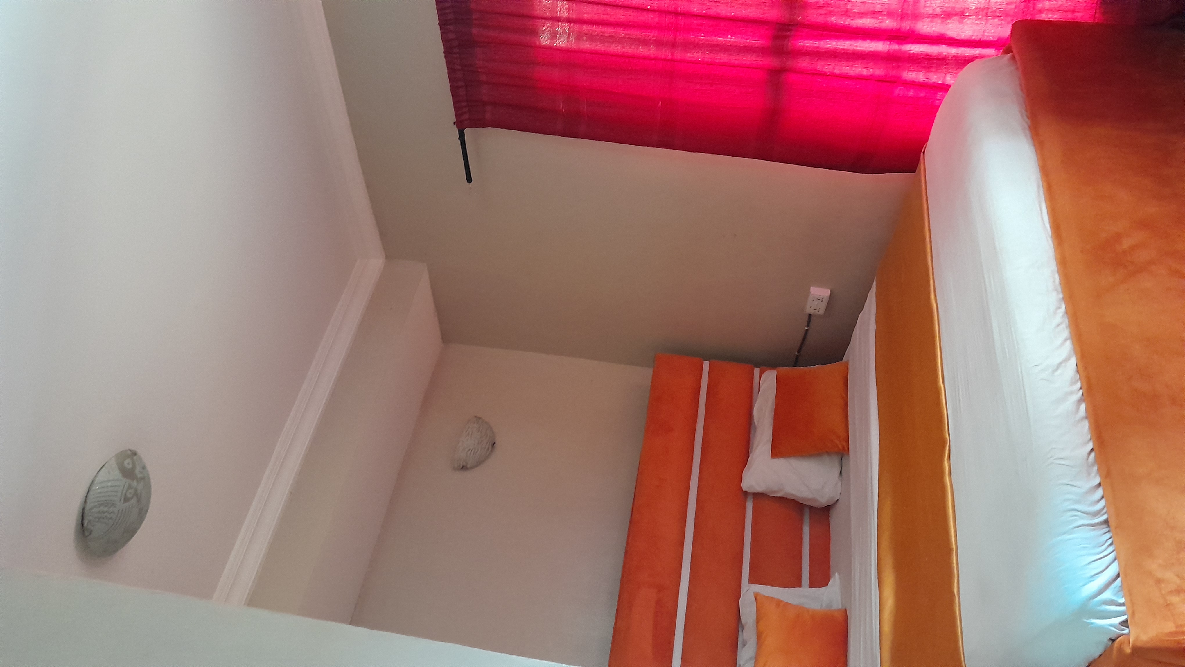 Orange Room at ChrisGardens Hotel