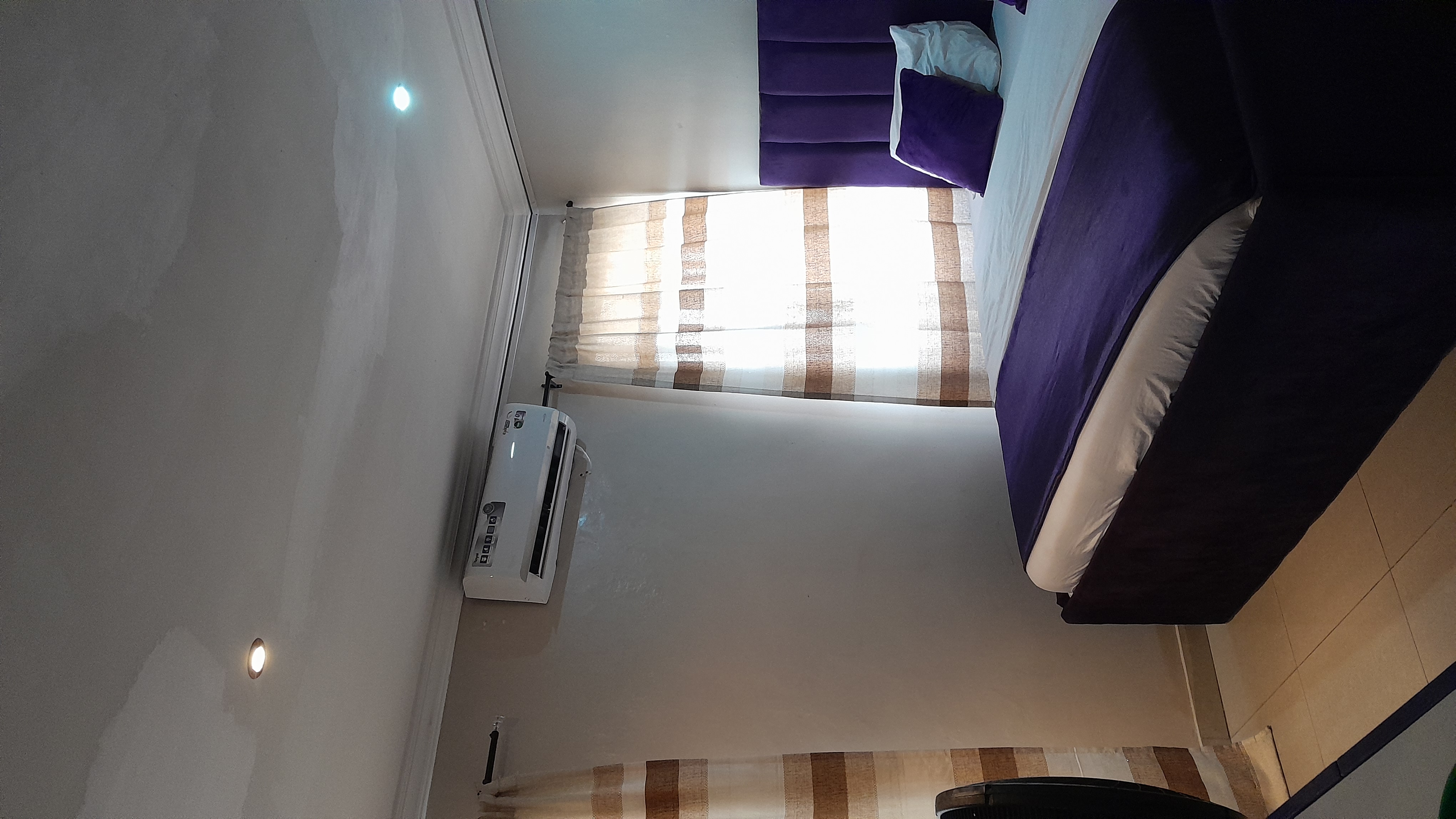 Purple Room at ChrisGardens Hotel